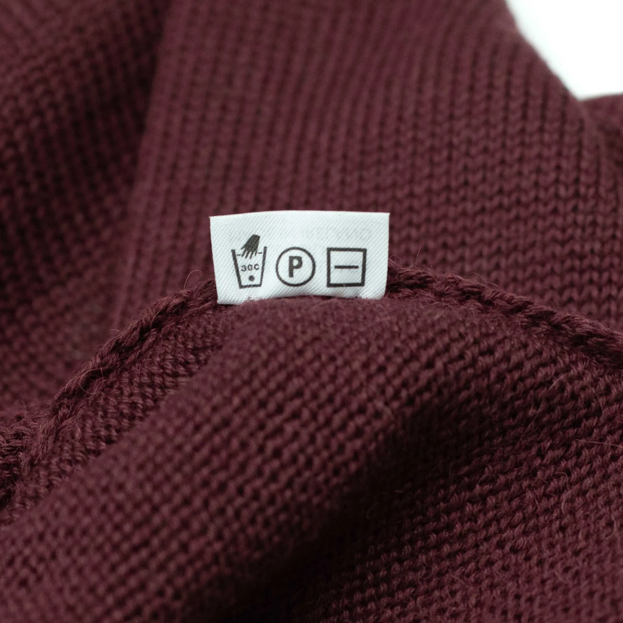 Long sleeve saddle shoulder polo in Bramble wine alpaca and silk