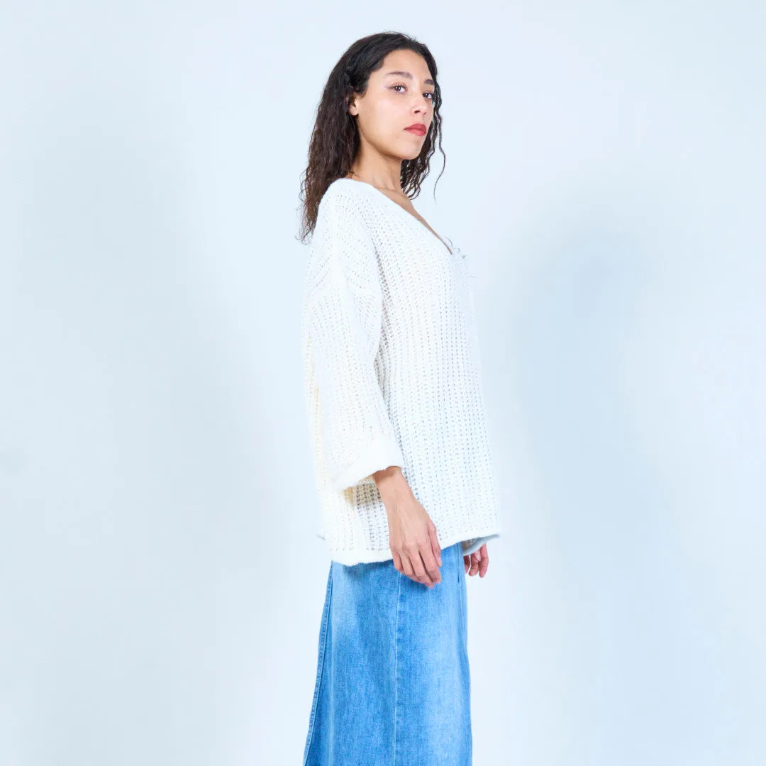 Loose knit sweater with feather detail wholesale